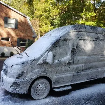 Mobile detailing service cleaning commercial vehicle as part of Work Vans & Commercial Vehicles maintenance